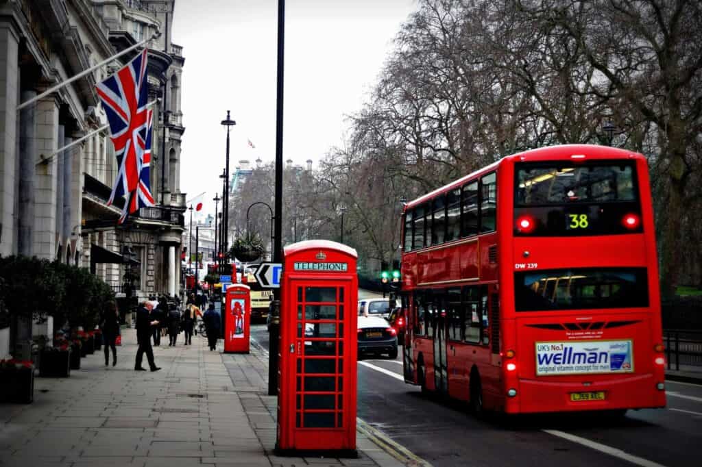 The double-decker bus on a busy street